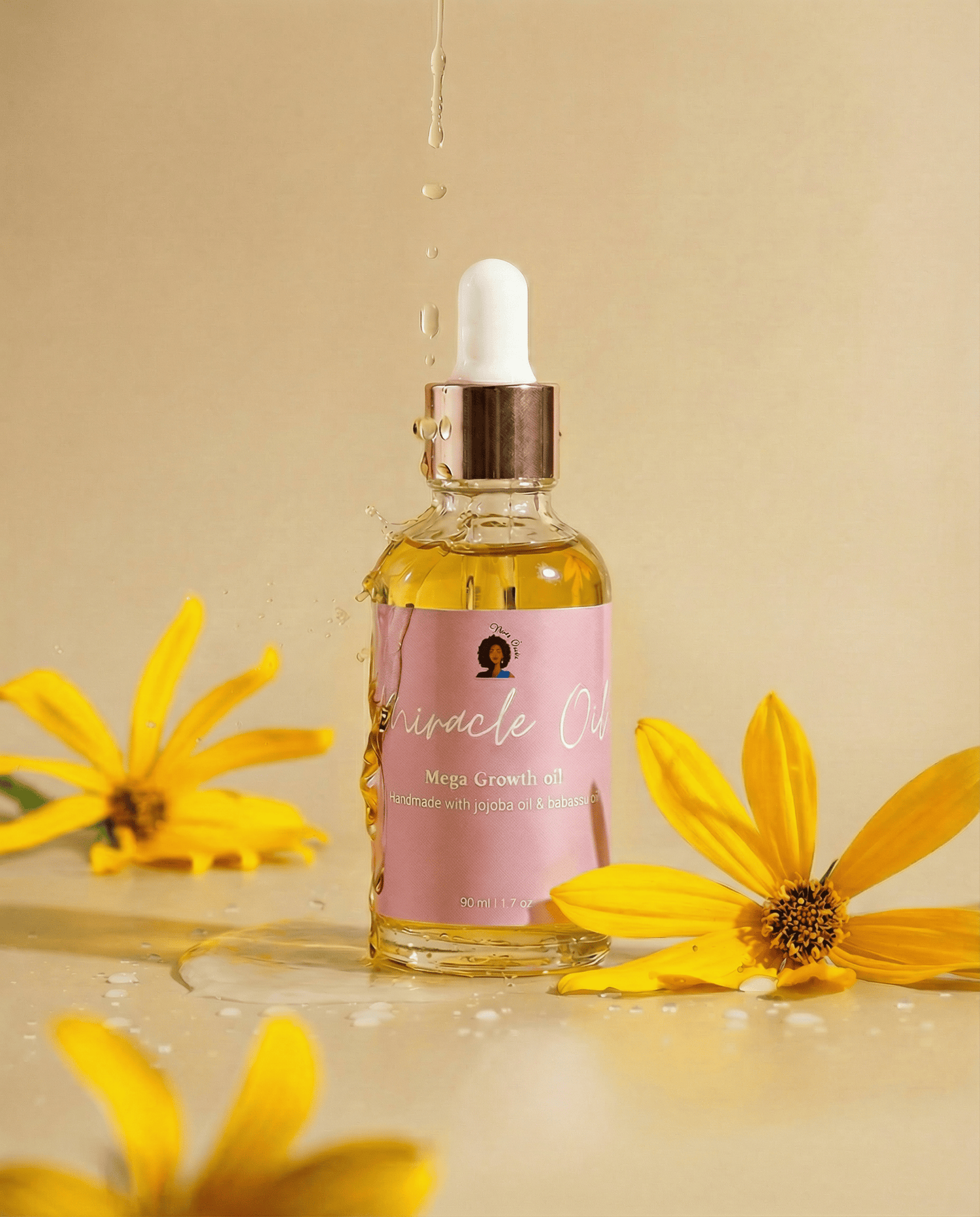 Bottle of Miracle Oil with a dropper surrounded by yellow flowers on a beige background