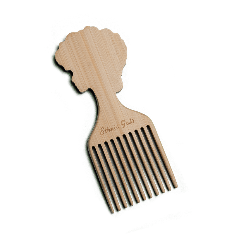 Wooden comb shaped like a person with 'Ethnica Gold' branding on a black background